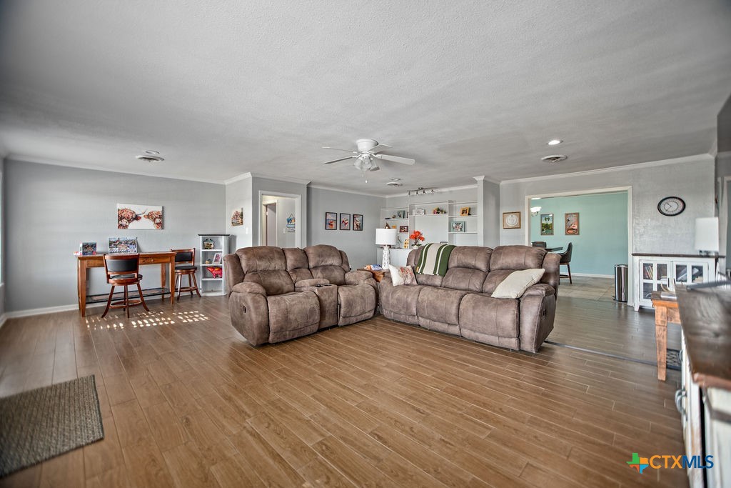 1315 Jackson Street Port Lavaca, TX 77979 - Photo 9 of 32 a living room with furniture and wooden floor
