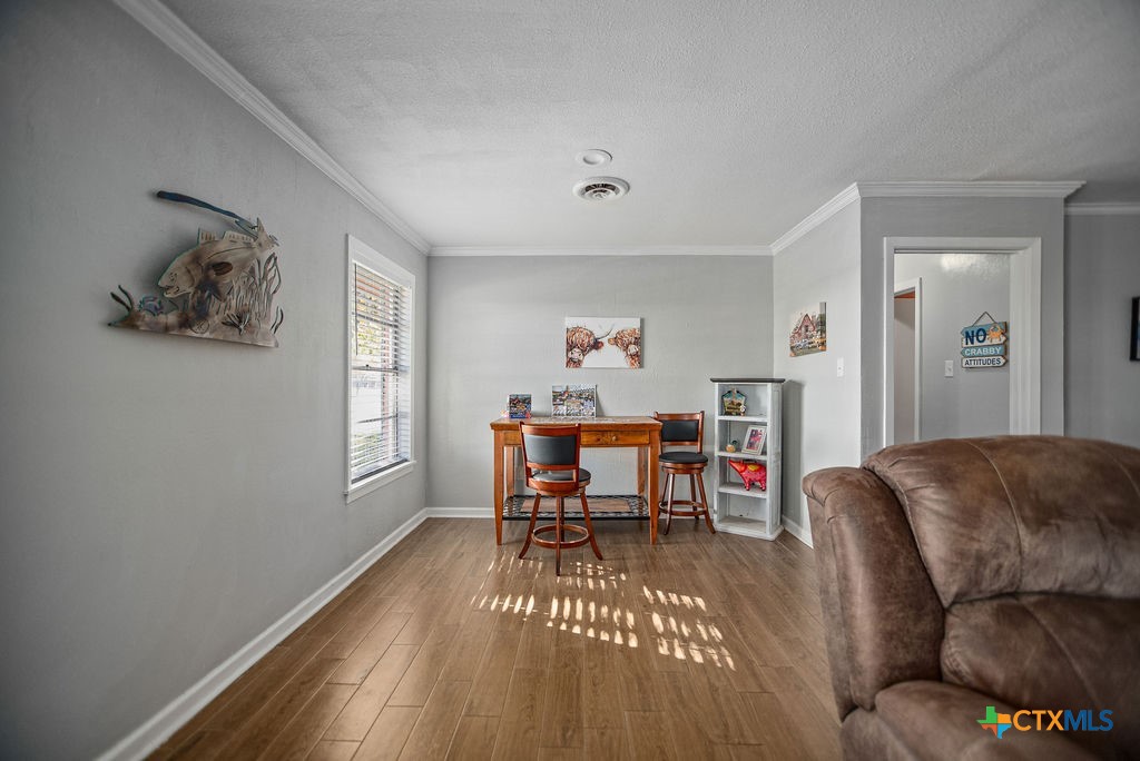 1315 Jackson Street Port Lavaca, TX 77979 - Photo 10 of 32 a living room with furniture and a window