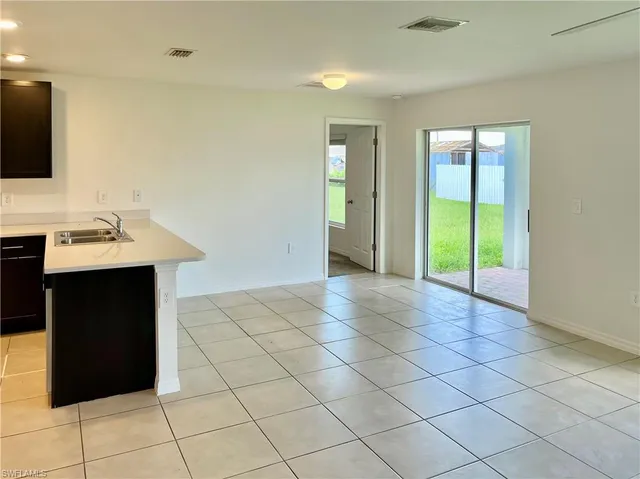 a view of a room that has a window in it