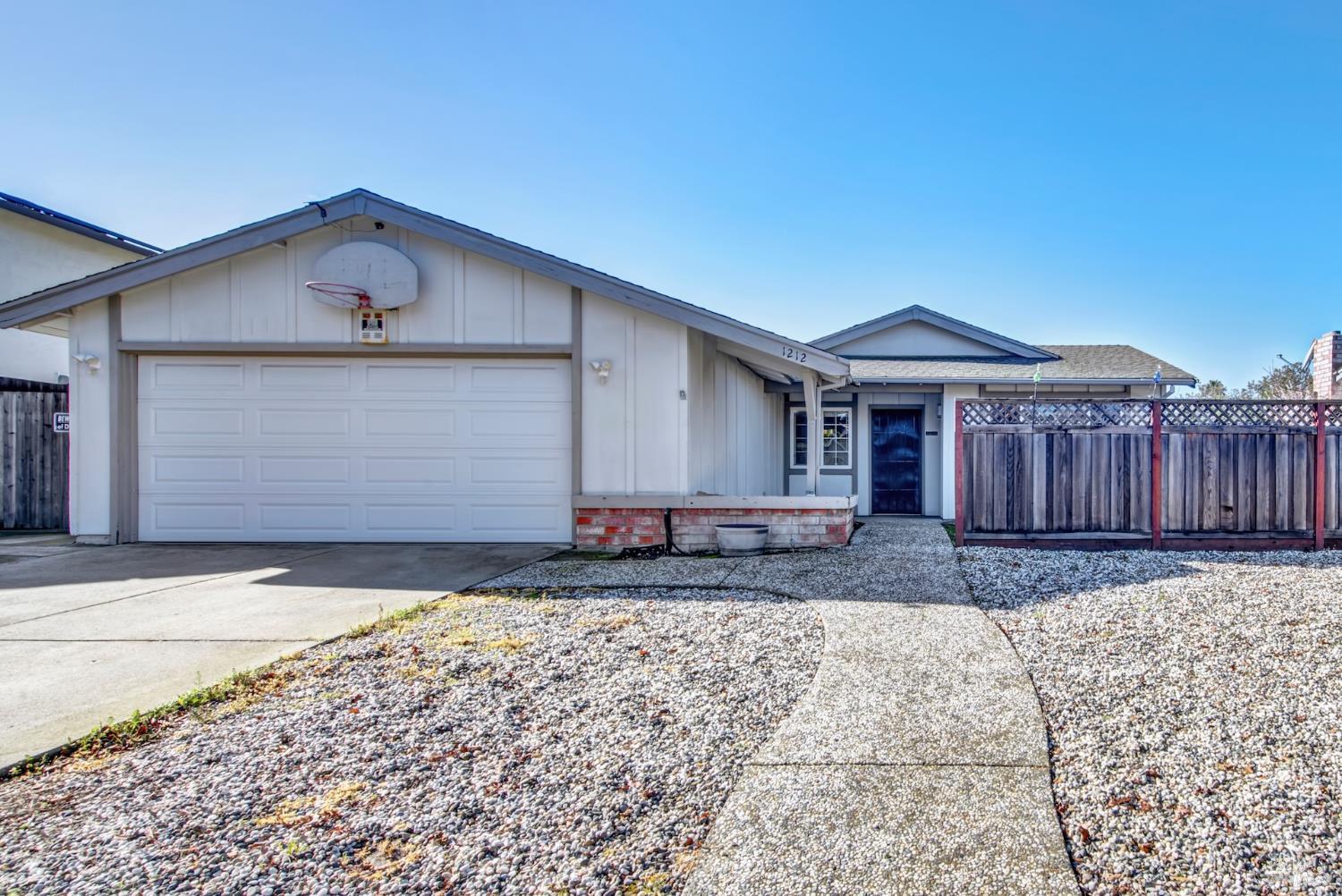1212 Stirling Drive Rodeo, CA 94572 - Photo 1 of 1 a front view of a house with garden