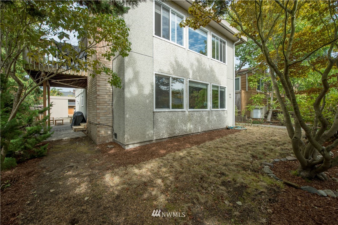 338 Northwest 46th Street Seattle, WA 98107 - Photo 3 of 25 a view of a house with a yard