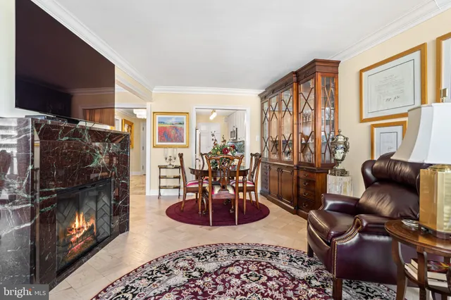 a kitchen with granite countertop a sink stainless steel appliances and cabinets