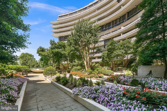a view of a building with sitting area