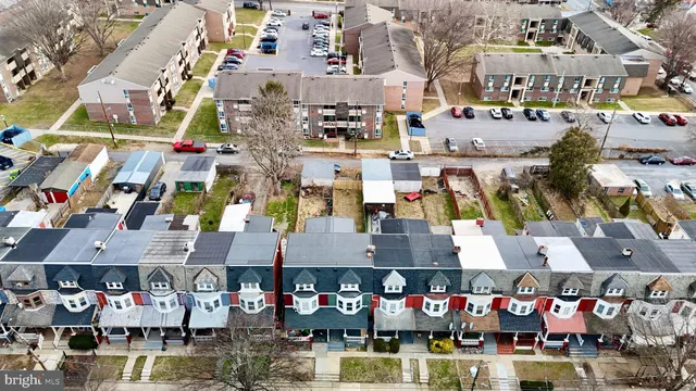 an aerial view of a city with lots of residential buildings