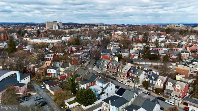 an aerial view of a city with lots of residential buildings