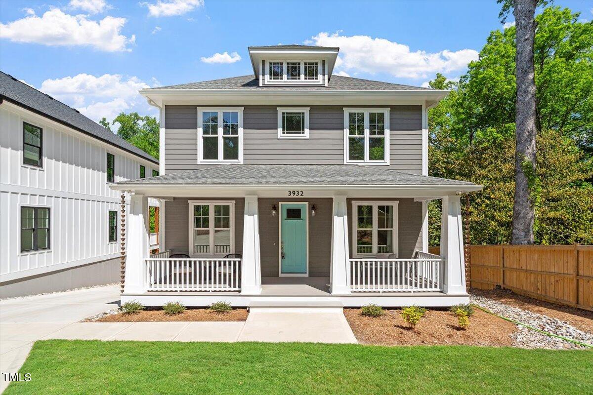 front view of a house with a yard