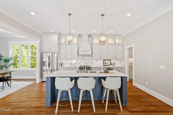 a dining table seating space and a chandelier