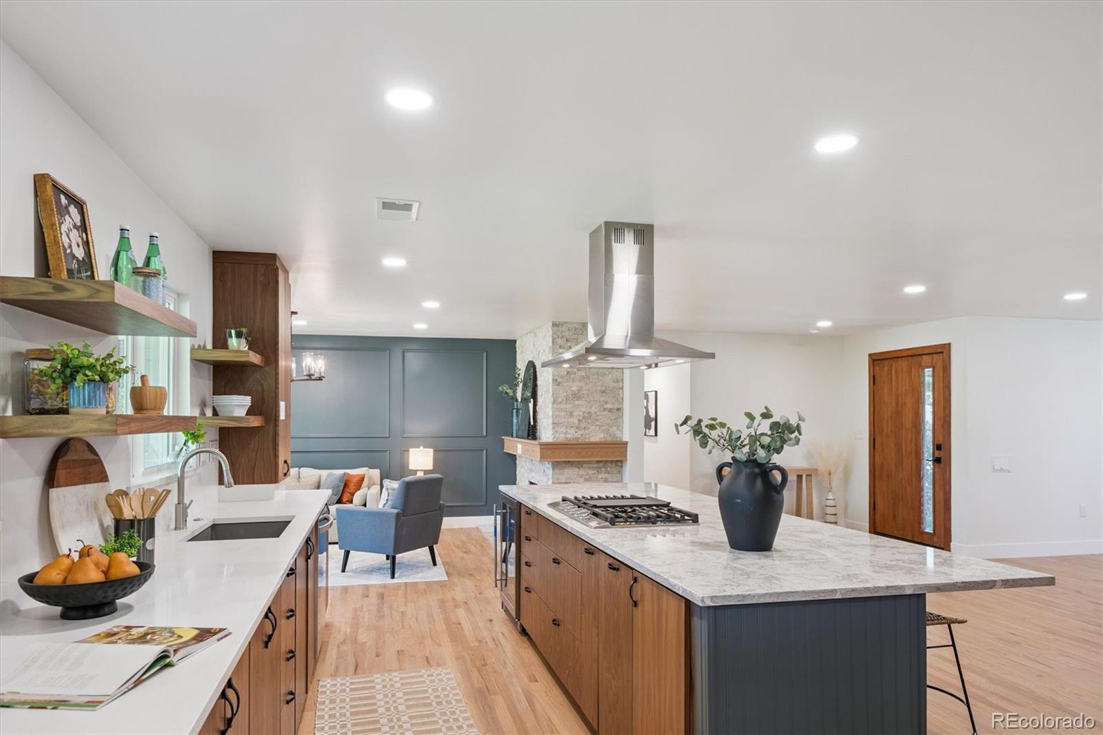 3775 South Forest Way Denver, CO 80237 - Photo 20 of 40 a kitchen with a stove and cabinets