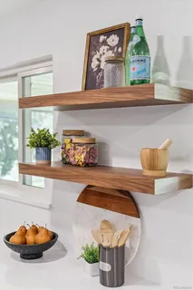 a kitchen with a sink and a stove