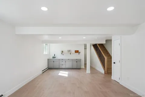 a view of storage and utility room with stairs