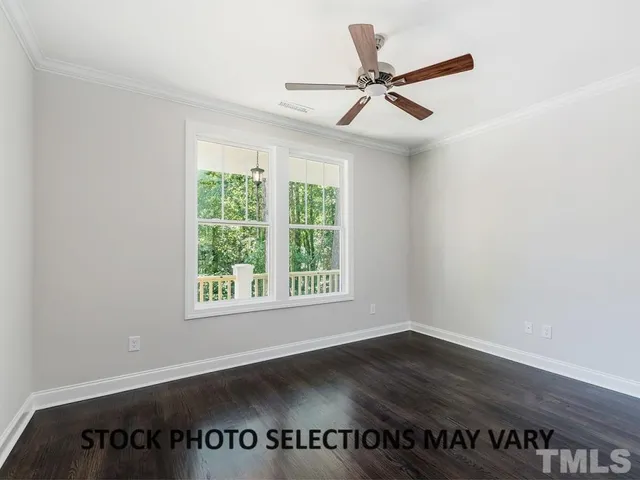 a view of a ceiling fan in a room
