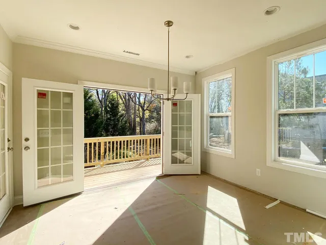 a view of a room with a large windows