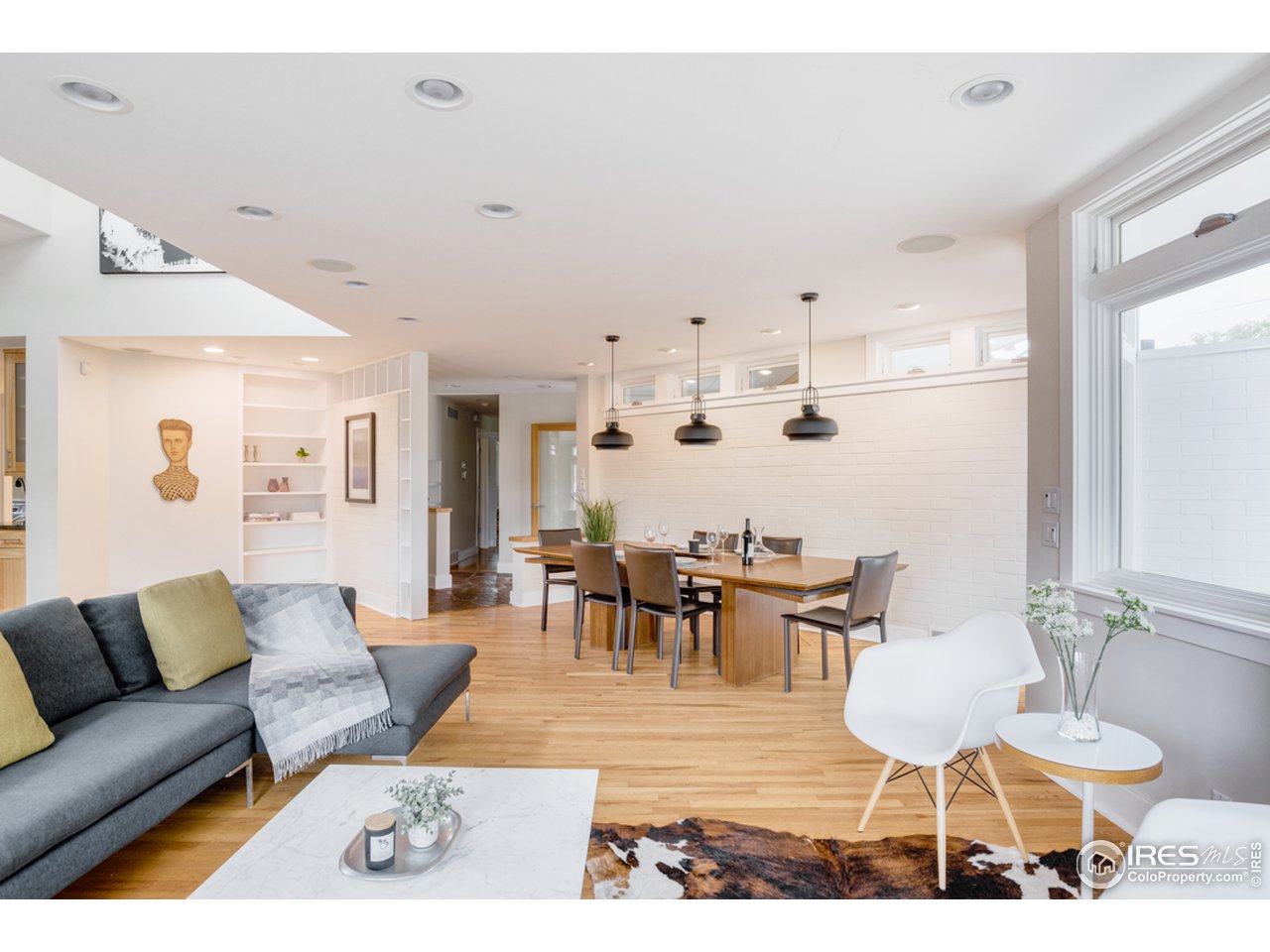 1491 High Street Boulder, CO 80304 - Photo 13 of 40 a living room with lots of furniture and kitchen view