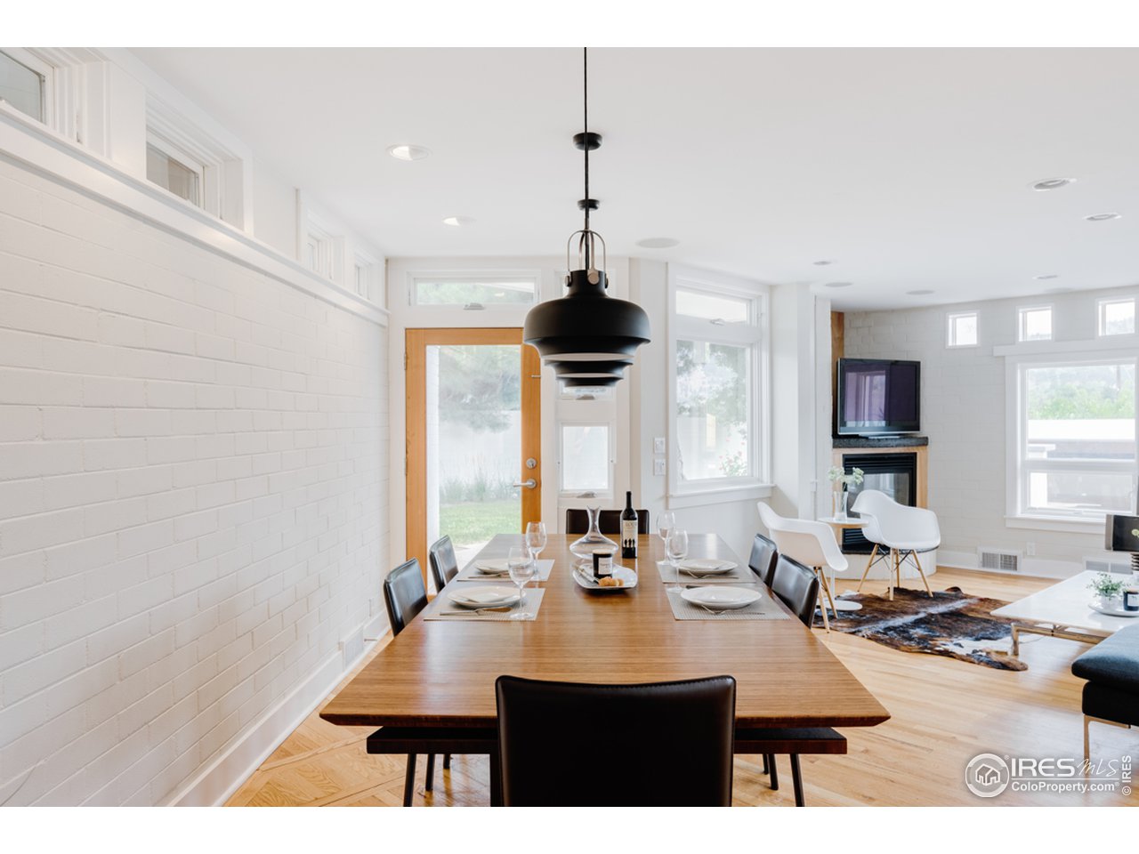 1491 High Street Boulder, CO 80304 - Photo 15 of 40 a view of a dining room with furniture