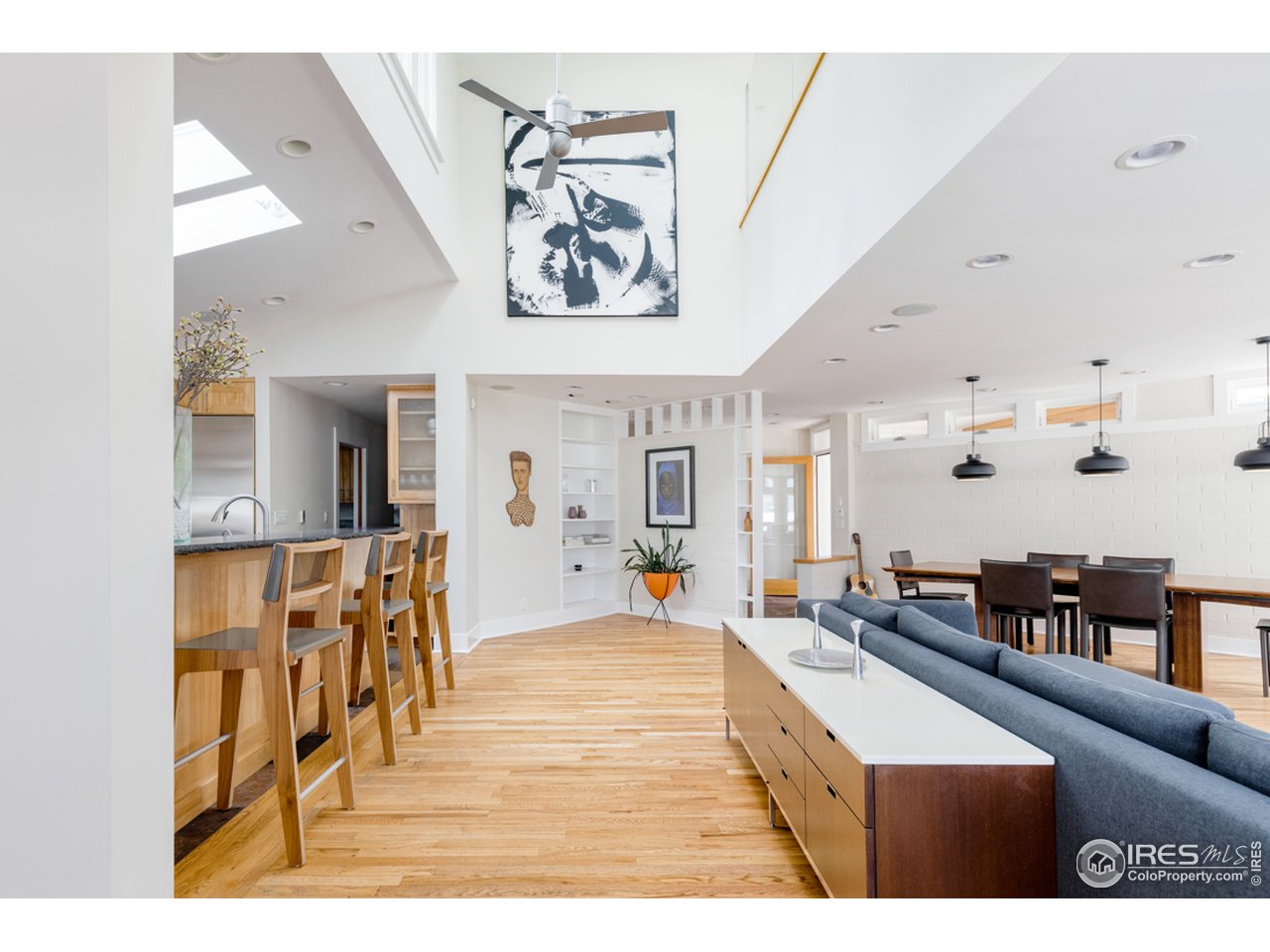 1491 High Street Boulder, CO 80304 - Photo 19 of 40 a living room with furniture and a large window