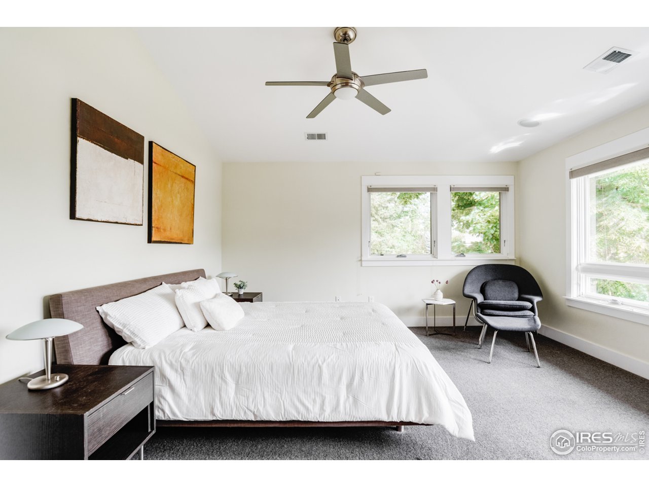 1491 High Street Boulder, CO 80304 - Photo 20 of 40 a bedroom with a bed and a window