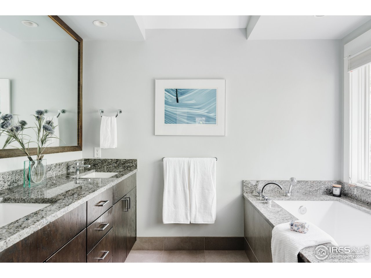 1491 High Street Boulder, CO 80304 - Photo 22 of 40 a bathroom with a sink and a mirror