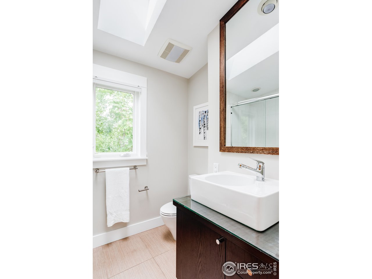 1491 High Street Boulder, CO 80304 - Photo 28 of 40 a bathroom with a sink and a mirror