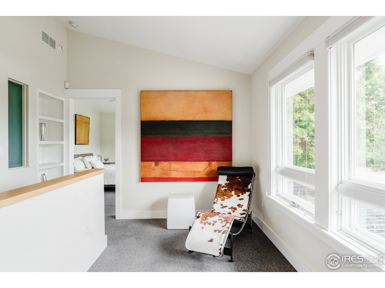 1491 High Street Boulder, CO 80304 - Photo 29 of 40 a living room with furniture and a flat screen tv