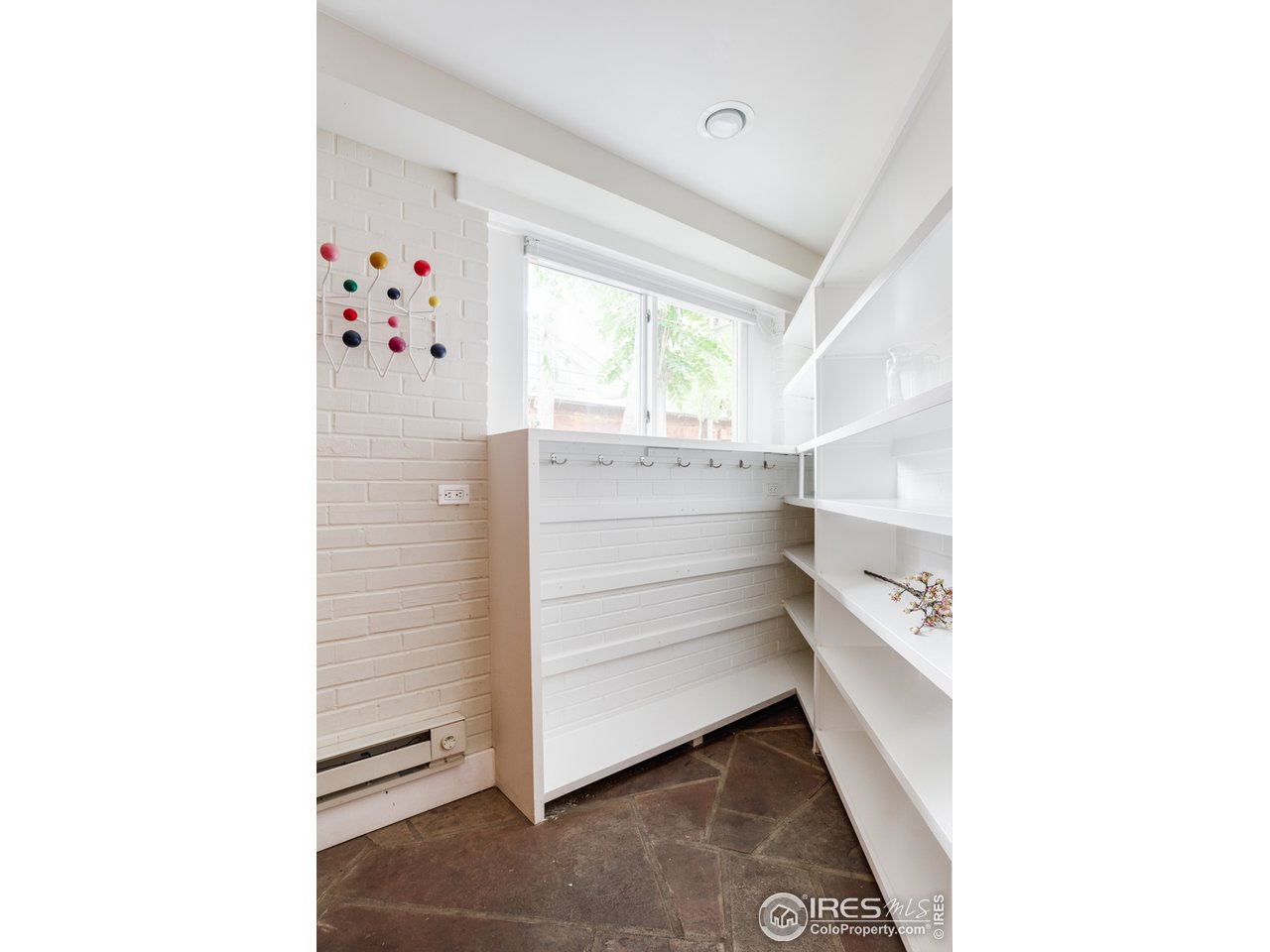 1491 High Street Boulder, CO 80304 - Photo 38 of 40 a view of store room with baby crib and window