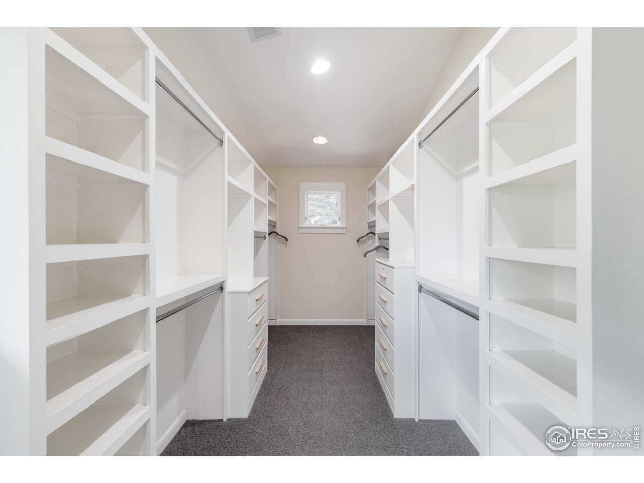 1491 High Street Boulder, CO 80304 - Photo 39 of 40 a view of walk in closet with empty racks