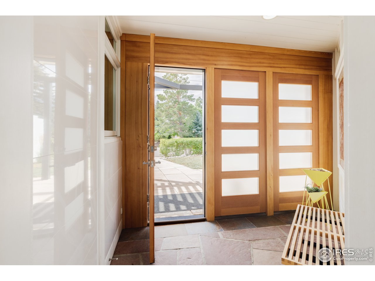 1491 High Street Boulder, CO 80304 - Photo 10 of 40 a living room with a large window