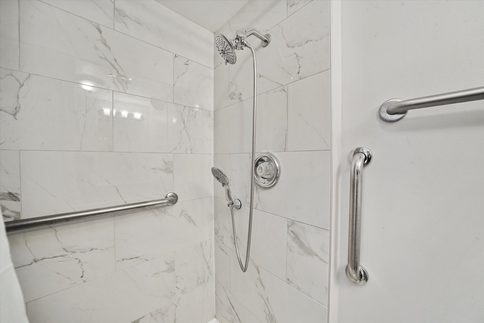 4240 North Keystone Avenue, Unit 2D Chicago, IL 60641 - Photo 13 of 18 a bathroom with a shower