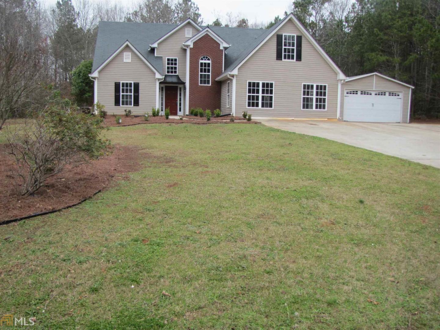 539 Wall Road Statham, GA 30666 - Photo 1 of 1 a front view of a house with a garden