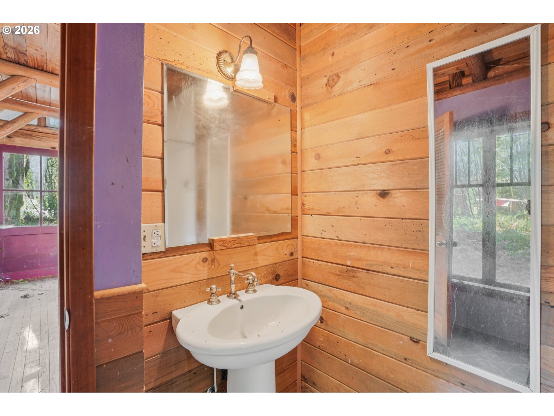 63875 East Barlow Trail Road Rhododendron, OR 97049 - Photo 13 of 17 a bathroom with a sink and a mirror