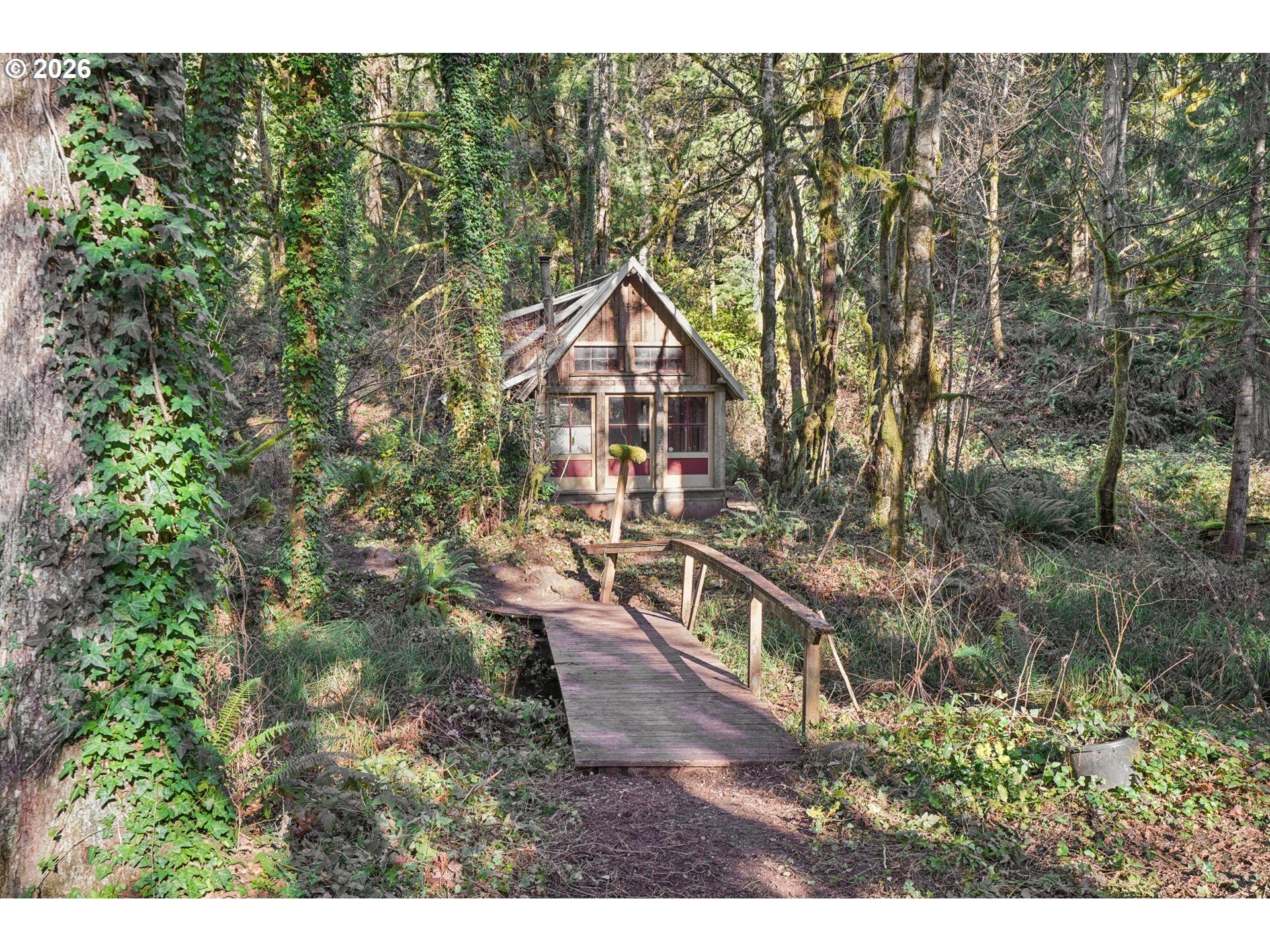 63875 East Barlow Trail Road Rhododendron, OR 97049 - Photo 2 of 17 a house view with a outdoor space