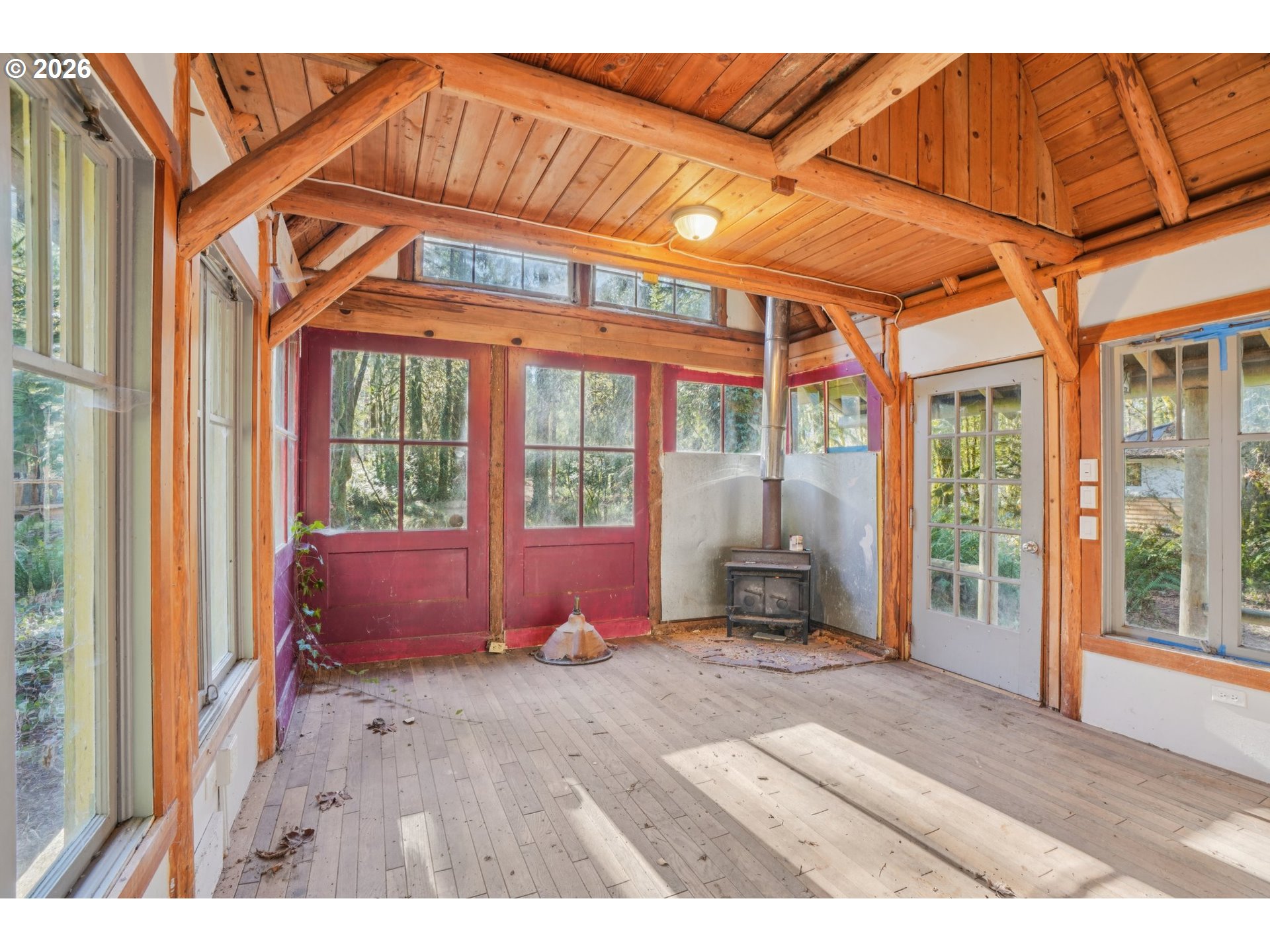 63875 East Barlow Trail Road Rhododendron, OR 97049 - Photo 5 of 17 a front view of a house with outdoor space