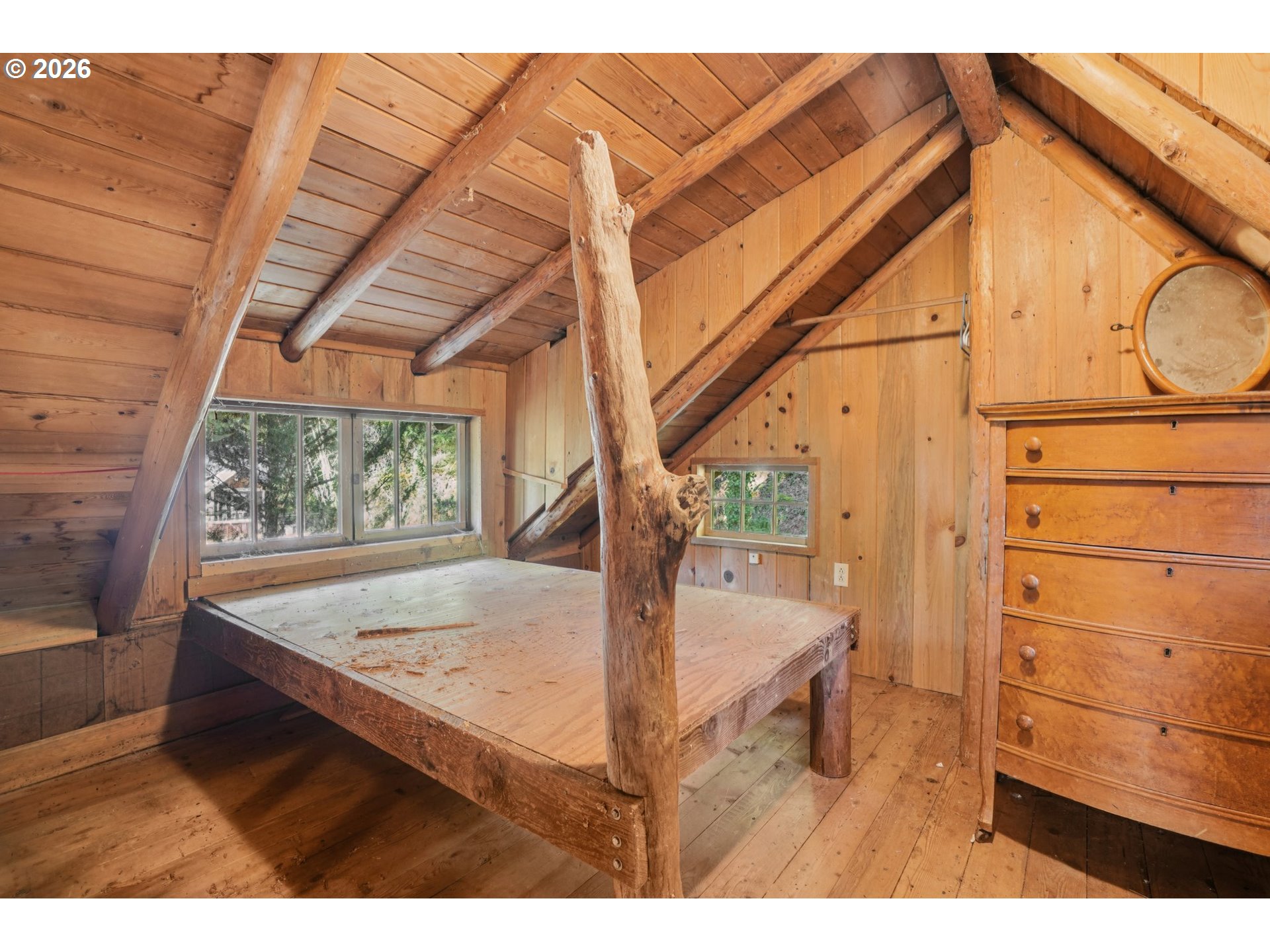 63875 East Barlow Trail Road Rhododendron, OR 97049 - Photo 9 of 17 a view of a hardwood floor