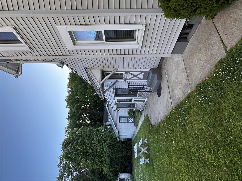5128 3rd Street Whitehall, PA 18052 - Photo 4 of 26 A well-maintained facade with neat landscaping offers inviting curb appeal.