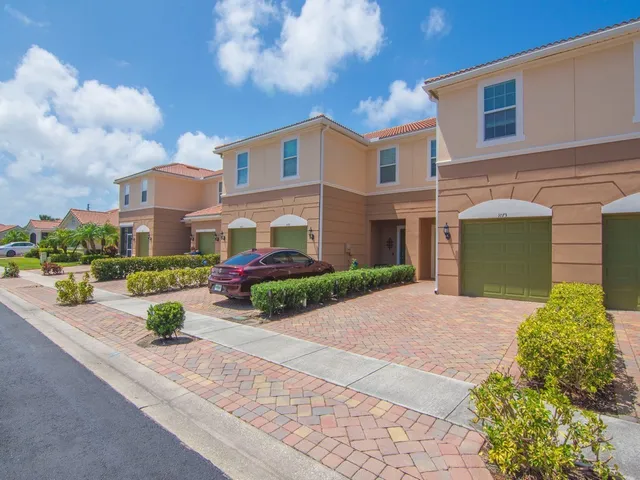 a view of a street with houses