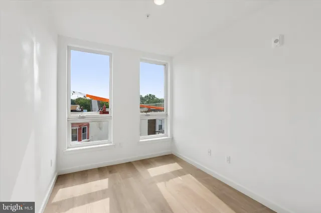 a view of an empty room and window