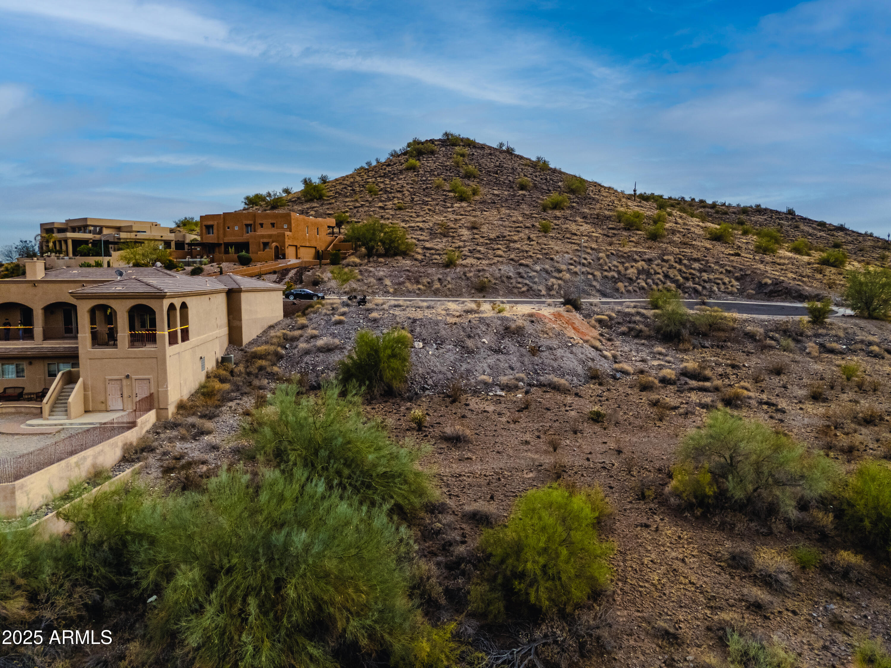 6152 West Alameda Road, Unit 11 Glendale, AZ 85310 - Photo 17 of 20 a view of a houses with a yard