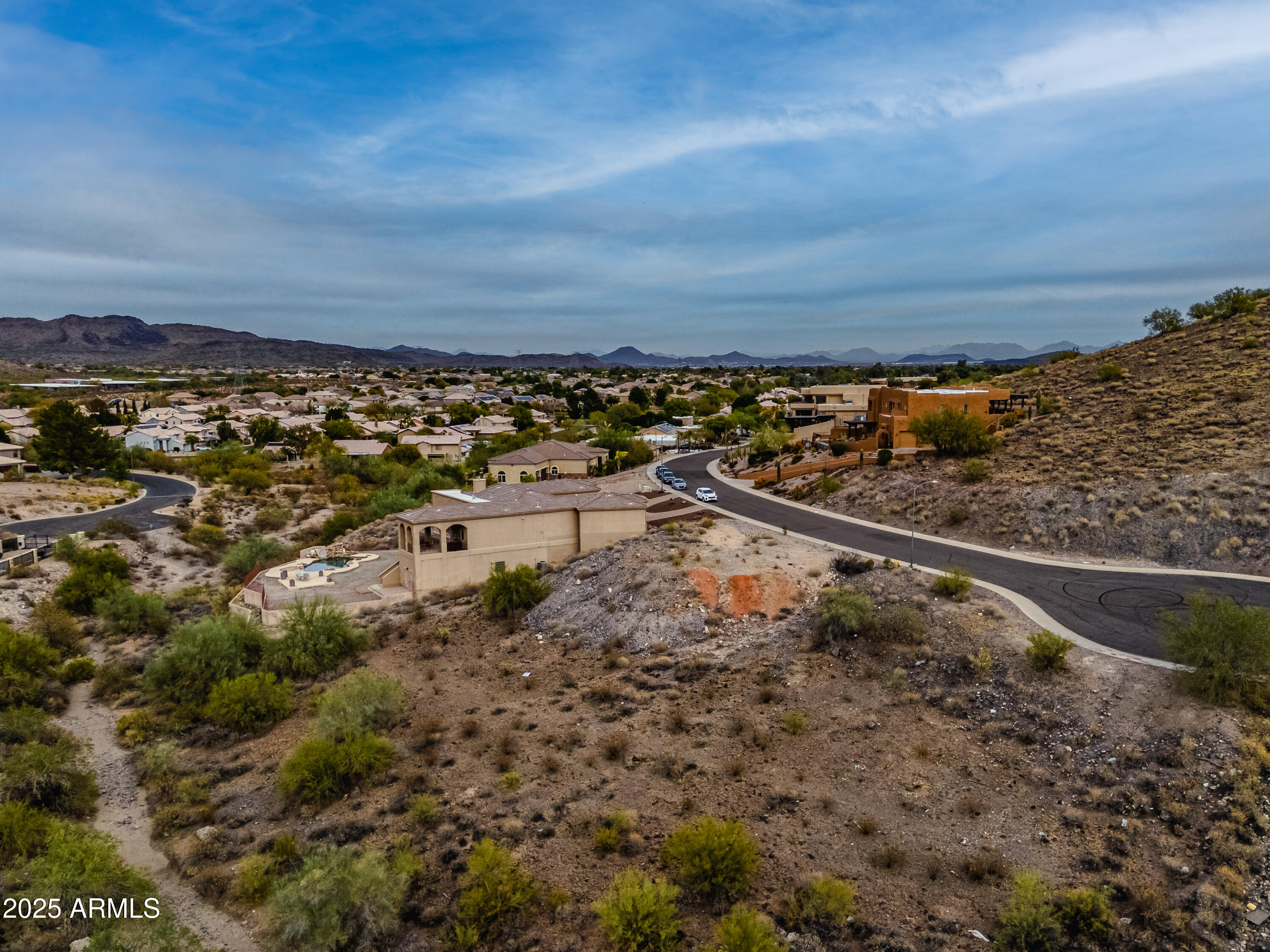 6152 West Alameda Road, Unit 11 Glendale, AZ 85310 - Photo 3 of 20 a view of a yard with wooden floor and city view