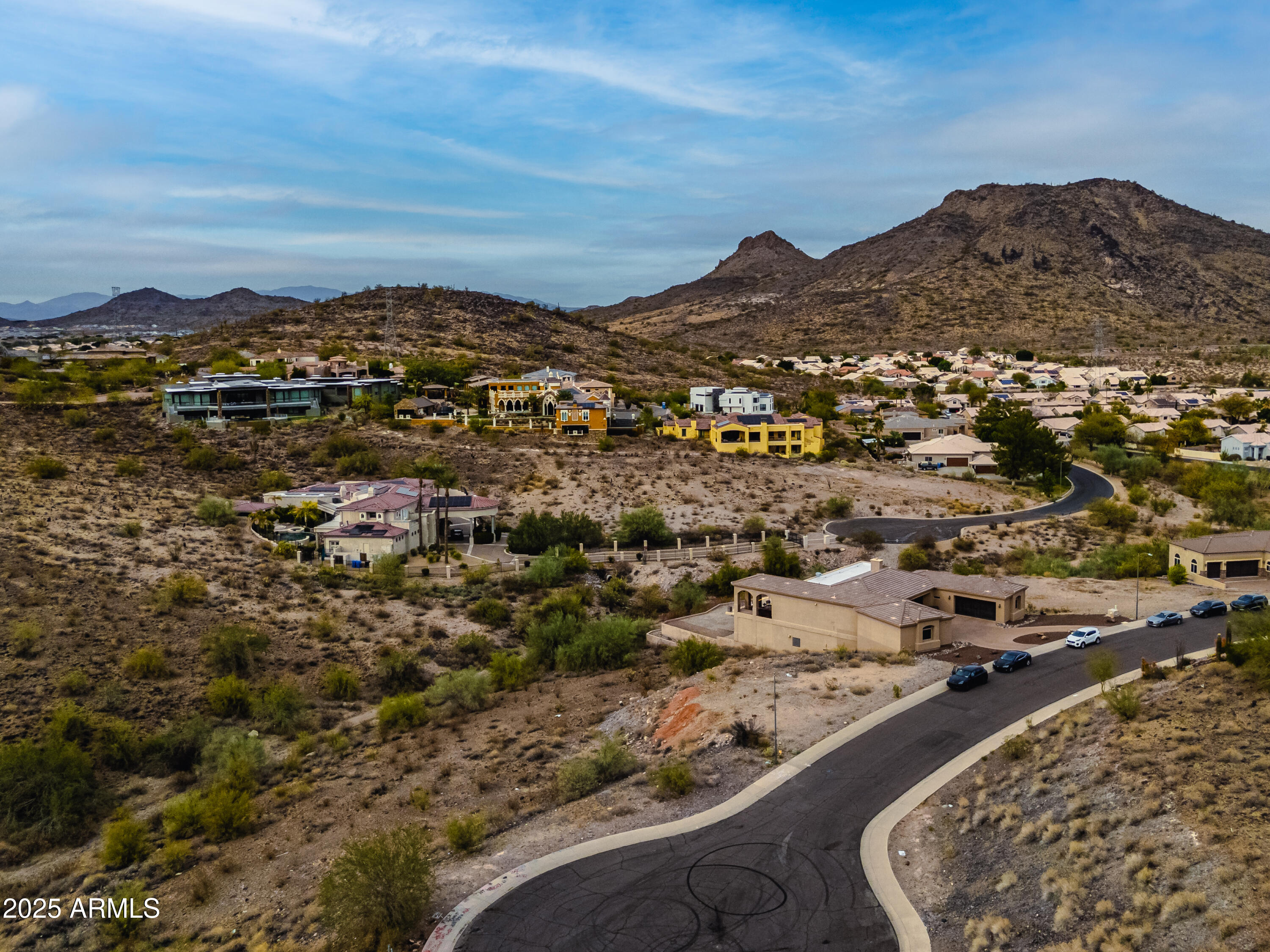 6152 West Alameda Road, Unit 11 Glendale, AZ 85310 - Photo 10 of 20 an aerial view of residential houses with outdoor space