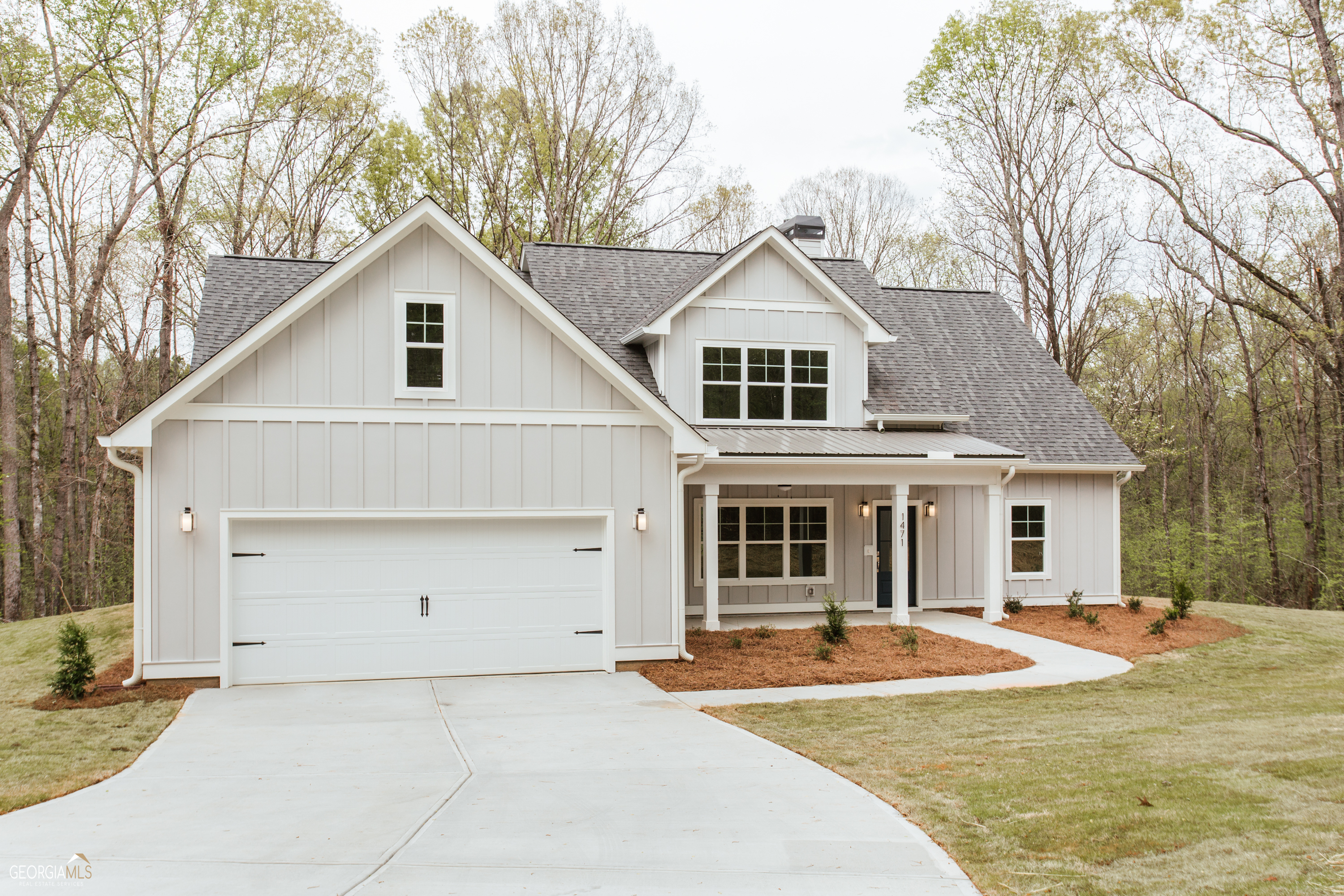 442 Old Airport Road Commerce, GA 30530 - Photo 1 of 1 a front view of a house with a yard and garage