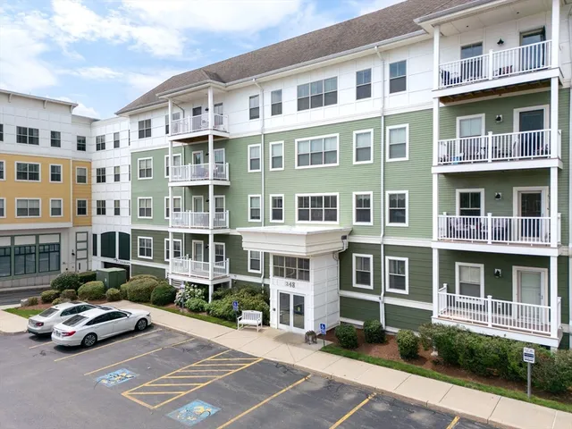 a front view of a building with street view