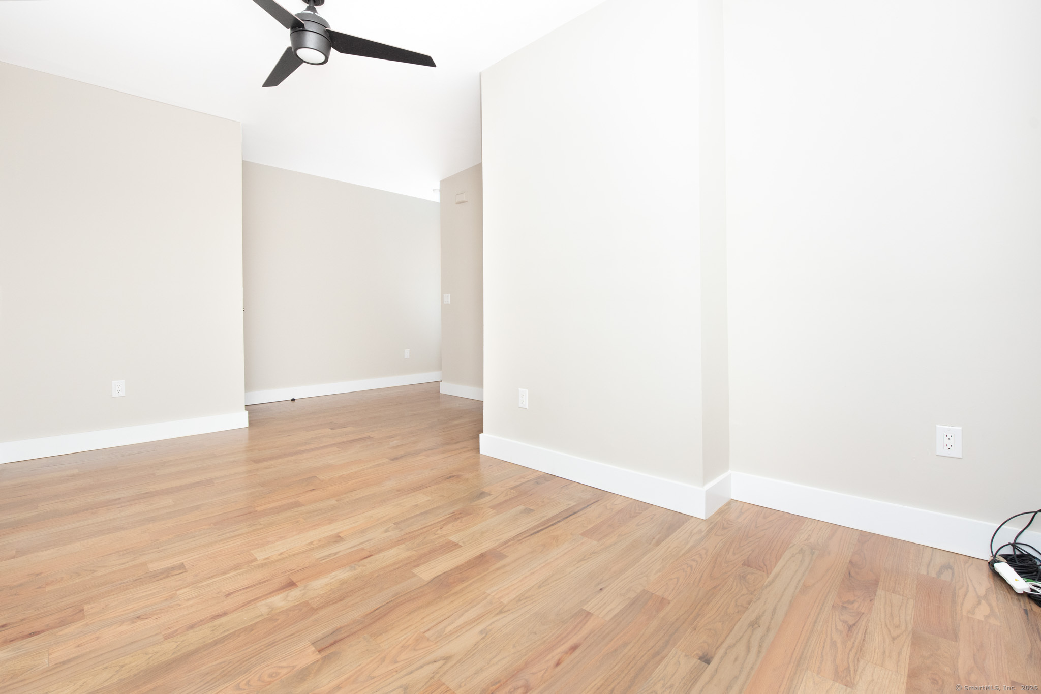 527 East Main Street Bridgeport, CT 06608 - Photo 8 of 25 a view of a room with wooden floor