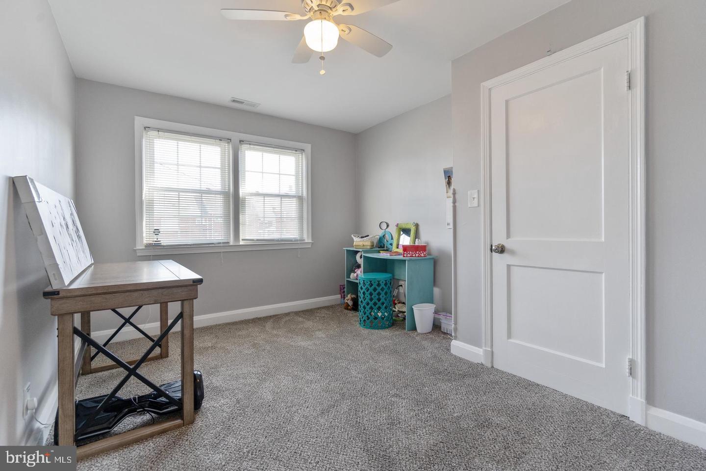 1067 Elm Road Halethorpe, MD 21227 - Photo 26 of 32 a living room with furniture and a window