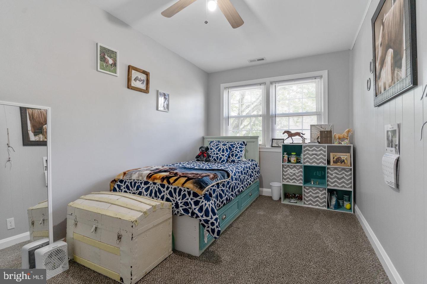 1067 Elm Road Halethorpe, MD 21227 - Photo 27 of 32 a bed room with a bed and a chair