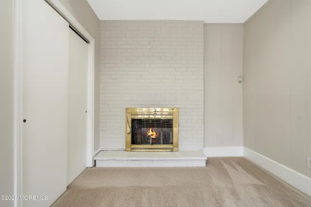 a living room with a fireplace