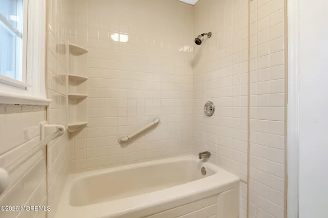 a bathroom with a bathtub