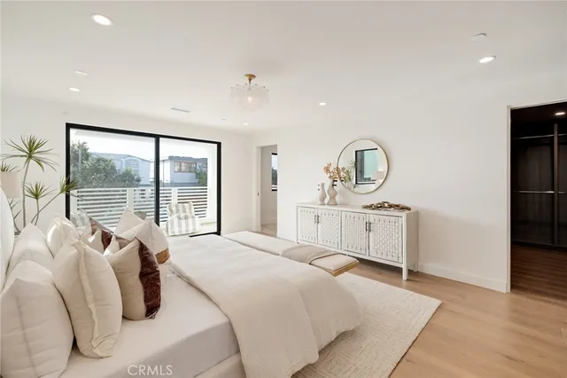 a spacious bathroom with a shower and a toilet