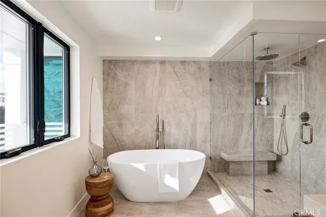 a en suite bathroom with a sink and mirror