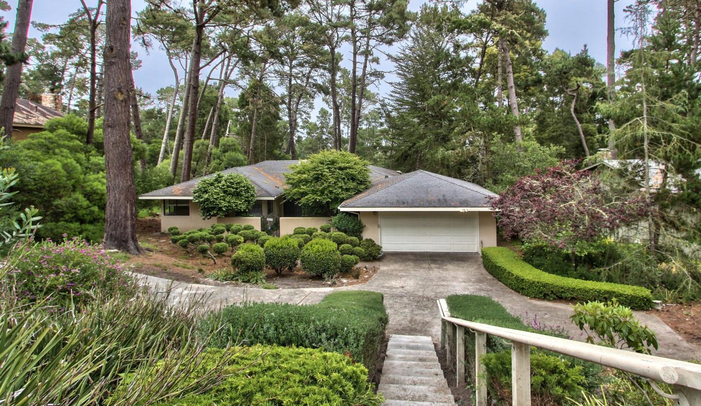 a house view with a garden space