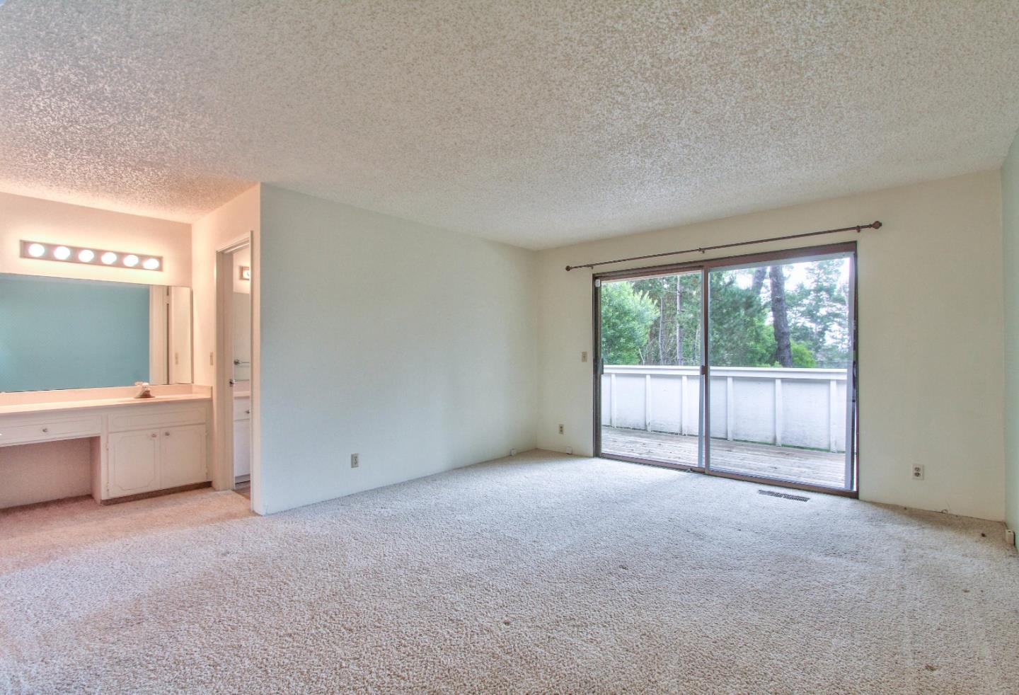 4025 Costado Road Pebble Beach, CA 93953 - Photo 11 of 21 a view of an empty room with a window