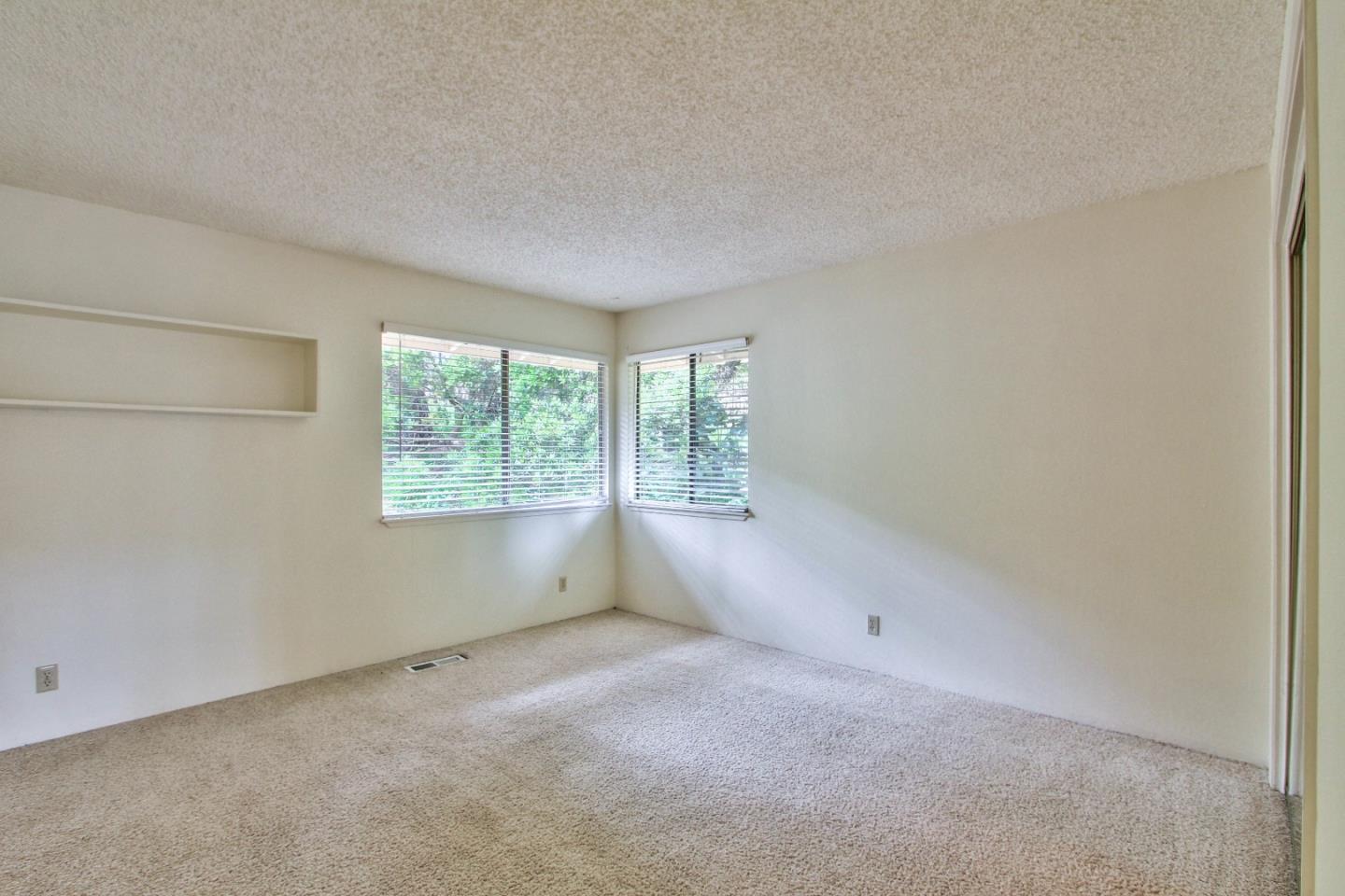 4025 Costado Road Pebble Beach, CA 93953 - Photo 15 of 21 an empty room with windows